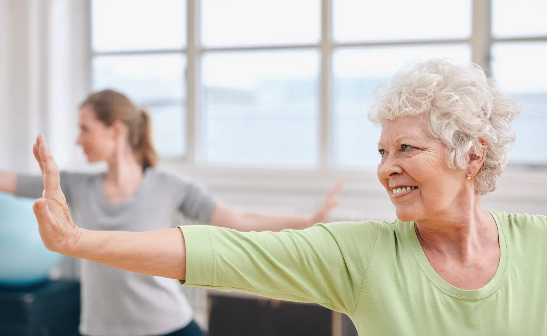 older woman at fitness class