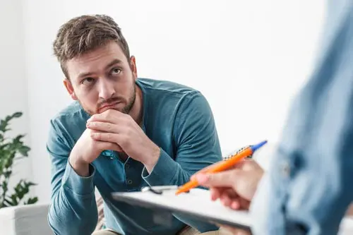 Bipolar man receiving help from professional