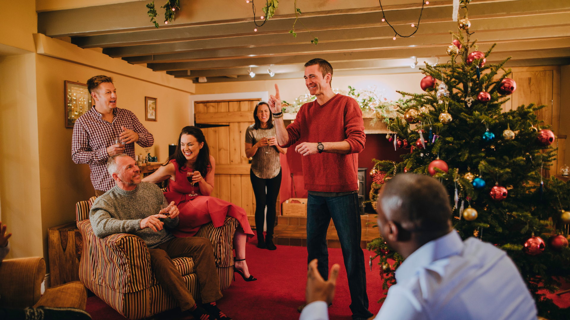 Image of family sharing family stories through charades.