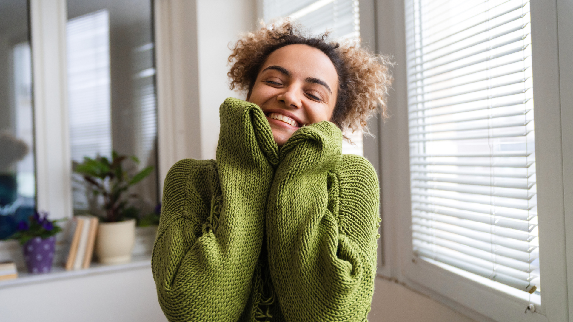 Woman practicing self-compassion, embracing the process of managing setbacks and practicing resilience.