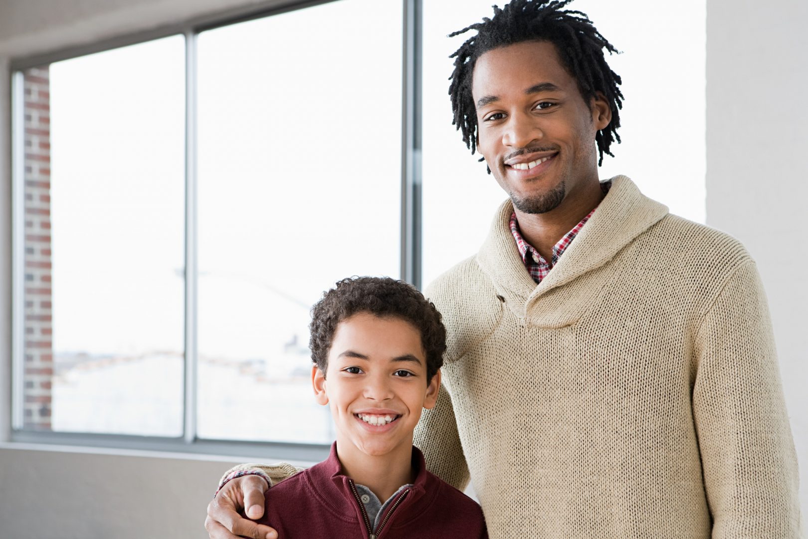 Man being mentor to young boy