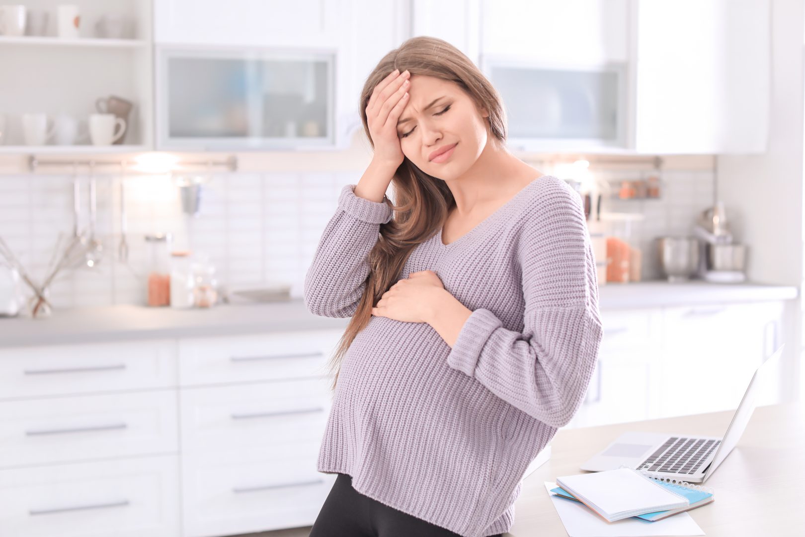 stressed pregnant woman experiencing depression