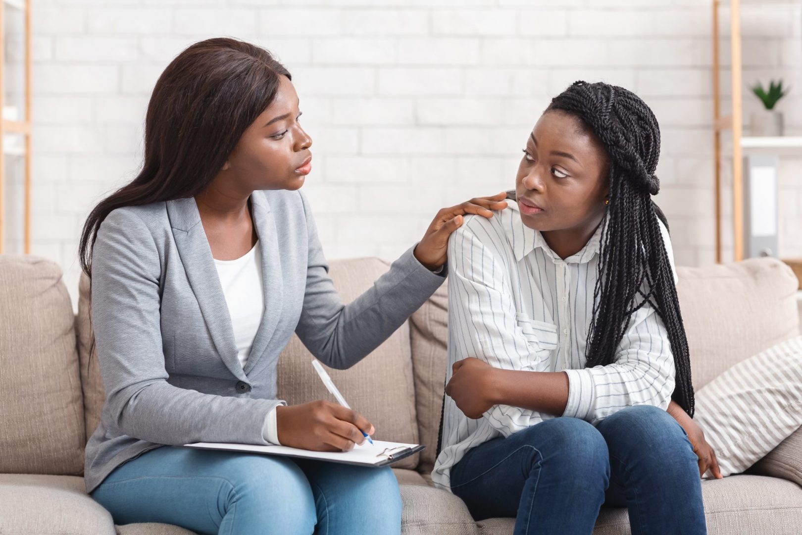 woman talking to psychotherapist for mental health counseling
