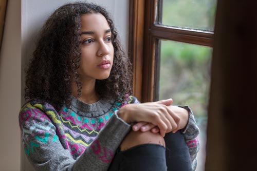 young mixed race woman mental health anxious