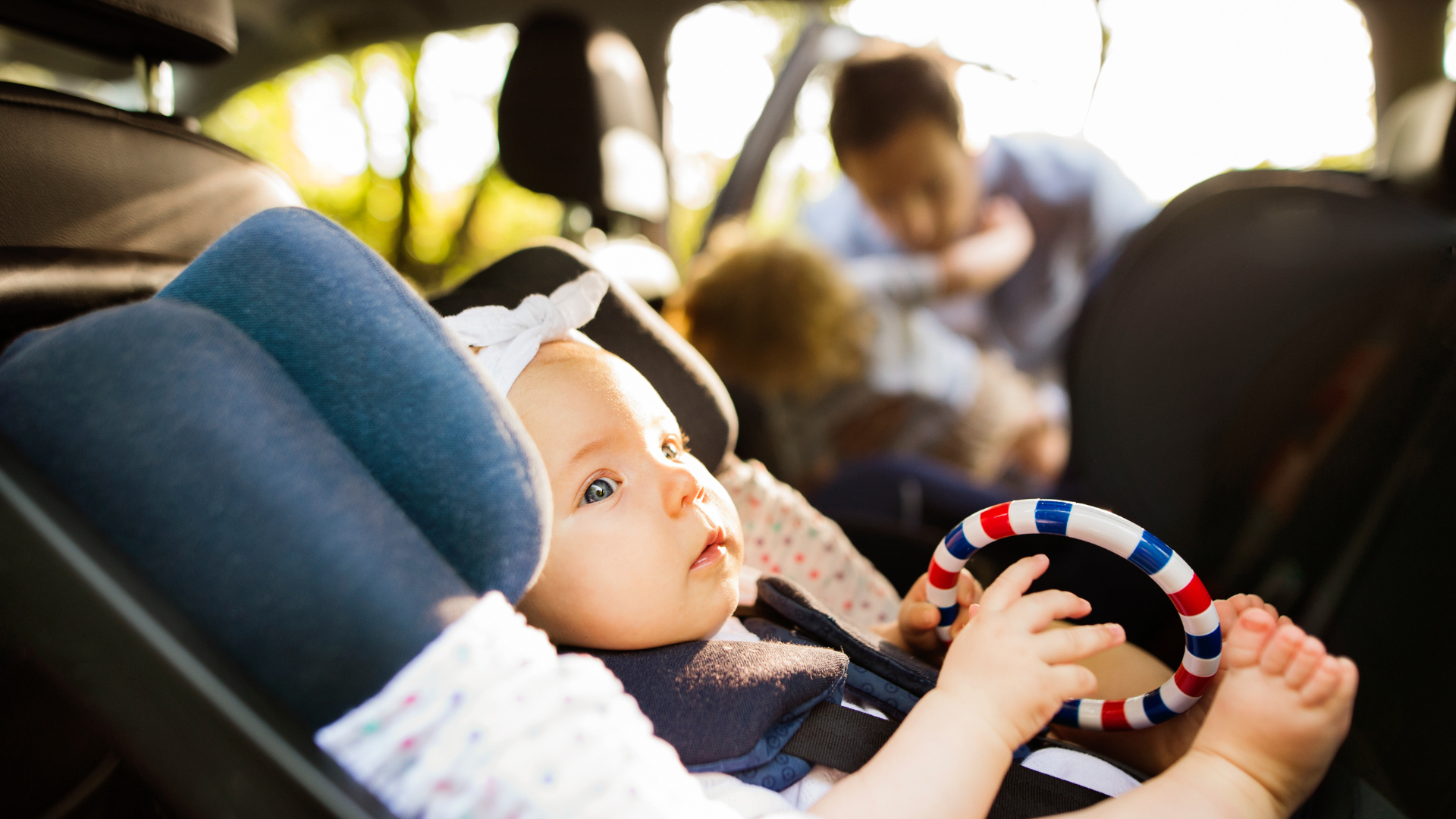 baby safety month, baby sitting in car seat